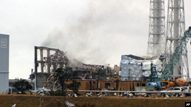Smoke is seen coming from the area of the No. 3 reactor of the Fukushima Daiichi nuclear power plant in Tomioka, Fukushima Prefecture in northeastern Japan on Mar 21 2011