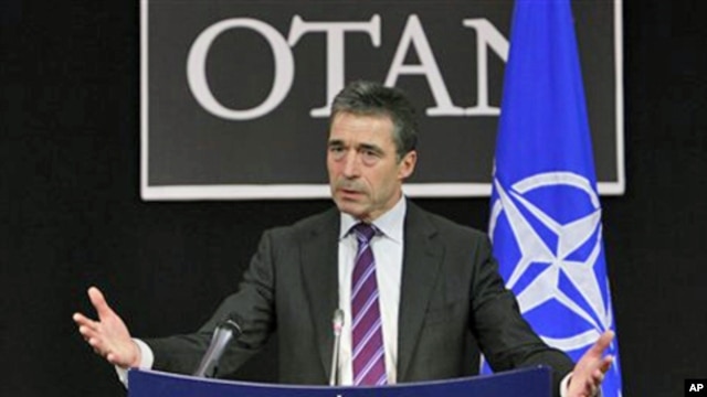 NATO Secretary General Anders Fogh Rasmussen speaks during a media conference after a meeting of NATO defense ministers at headquarters in Brussels, March 10, 2011