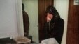 Zhila Bani-Yaghoub speaks on the telephone in her office in Tehran in this file photo. 