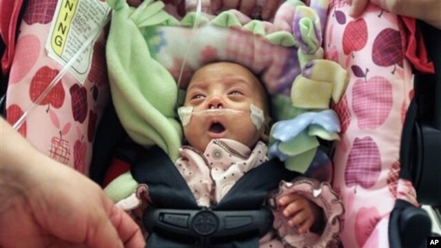 Prematurely born Melinda Star Guido discharged from Los Angeles County-USC Medical Center, Friday, Jan. 20, 2012.