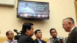 VOA Khmer reporters Men Kimseng, Poch Reasey, and Sok Khemara interviewing US Congressman Dana Rohrabacher of California during House hearing on ‪#‎Cambodia‬ on July 9, 2013. (VOA Khmer/Sophat Soeung)