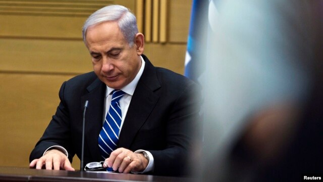 Israel's Prime Minister Benjamin Netanyahu attends a Likud-Beitenu party meeting, at the Knesset, the Israeli parliament, in Jerusalem, Mar. 14, 2013.