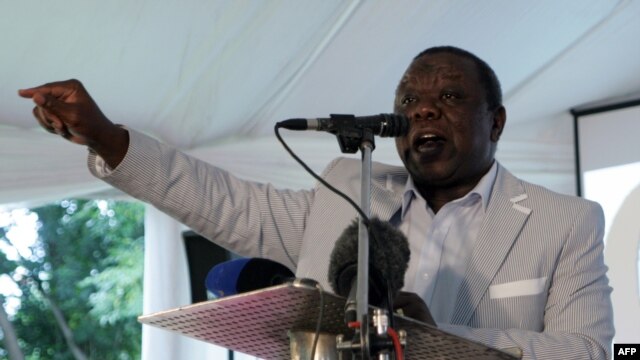 Zimbabwe's Prime Minister Morgan Tsvangirai addresses a meeting with representatives of civic groups in Harare on February 13, 2013, during which announced the date for a referendum on the constitution. 