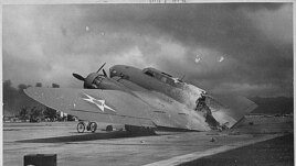 A burnt B-17C aircraft rests near Hangar Number Five, Hickam Field, following the attack by Japanese aircraft on Pearl Harbor, Hawaii December 7, 1941. December 7, 2011 marks the 70th anniversary of the Pearl Harbor attack in which over 2,400 members of t