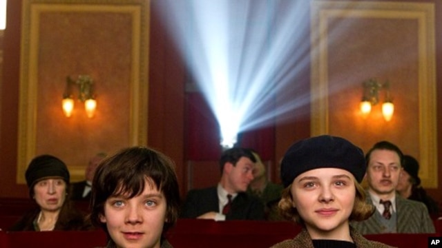 Left to right: Asa Butterfield plays Hugo Cabret and Chloë Grace Moretz plays Isabelle in HUGO, from Paramount Pictures and GK Films.
