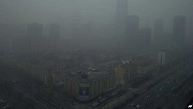 Skyscrapers are obscure by heavy haze in Beijing, China, January 13, 2013. 