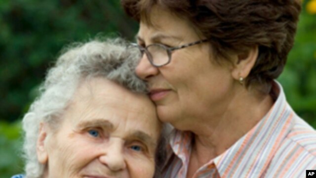 Alzheimer's patient and caregiver.