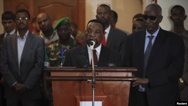 UN special envoy for Somalia Augustine Mahiga. center (file photo, AU-UN via Reuters).