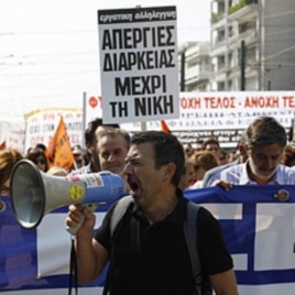 Protesters shout slogans during demonstration in Athens, Greece, October 5, 2011.