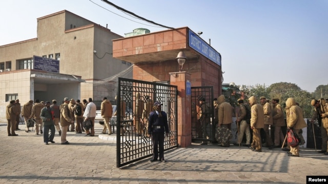Policemen report for duty at a district court, where the accused in a gang rape are to be produced for trial, in New Delhi, India, January 10, 2013.