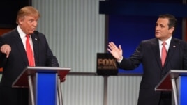 Republican presidential candidate businessman Donald Trump, left, and rival Sen. Ted Cruz, R-Texas, both speak during the Fox Business Network Republican presidential debate at the North Charleston Coliseum, Jan. 14, 2016, in North Charleston, S.C.  