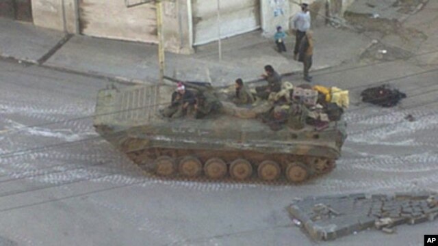 A Syrian army tank is seen in the Zabadani neighborhood of  Damascus (file photo).