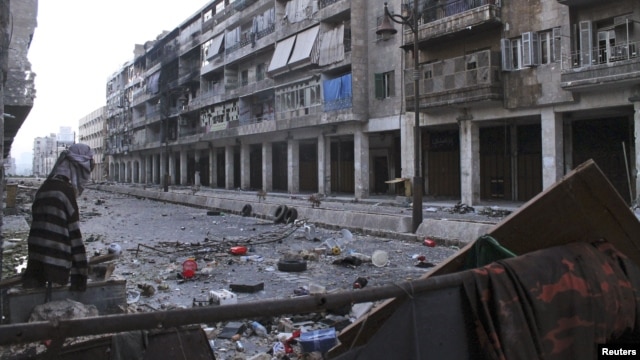 Mannequins are set up to confuse snipers loyal to Syria's President Bashar al-Assad in the old city of Aleppo, December 23, 2012. 