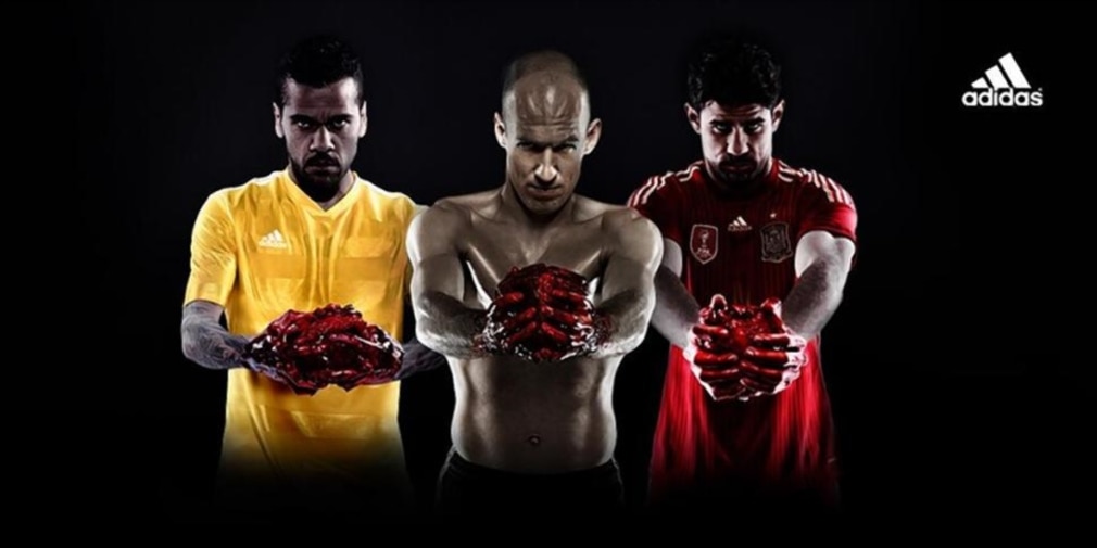 Adidas ad featuring football players holding cow hearts.