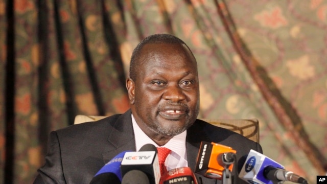 FILE - South Sudan rebel leader Riek Machar addresses journalists during a news conference in Nairobi, Kenya, July 8, 2015.