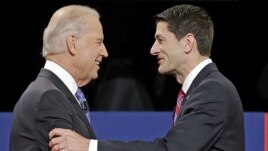 Vice President Joe Biden (l) and Republican vice presidential nominee Rep. Paul Ryan of Wisconsin shake hands before the vice presidential debate at Centre College,  in Danville, Kentucky, Oct. 11, 2012.