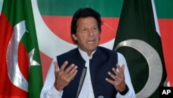Pakistan's opposition leader Imran Khan speaks during a press conference in Islamabad, Pakistan, Sunday, April 10, 2016. Khan called on Prime Minister Nawaz Sharif to resign.