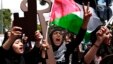 Palestinian women rally to mark Nakba Day in the West Bank town of Ramallah, May 15, 2013. 