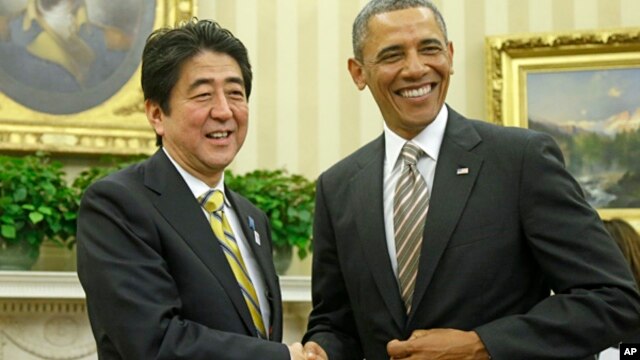 Japanski premijer Šinzo Abe i predsednik Barak Obama tokom susreta u Beloj kući