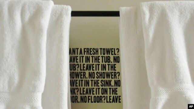 Hotel guests are reminded to save the planet, by keeping their used towels, when they step into the shower.