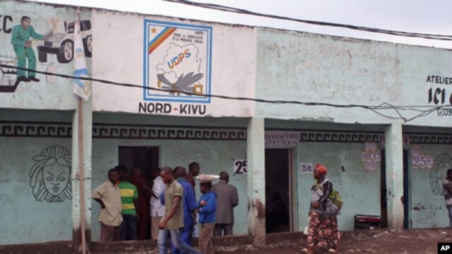 Supporters say they don't trust the results, but say they will not protest until their leader, Etienne Tshisekedi, directs them, outside local opposition headquarters, Goma, DRC, December 6, 2011.
