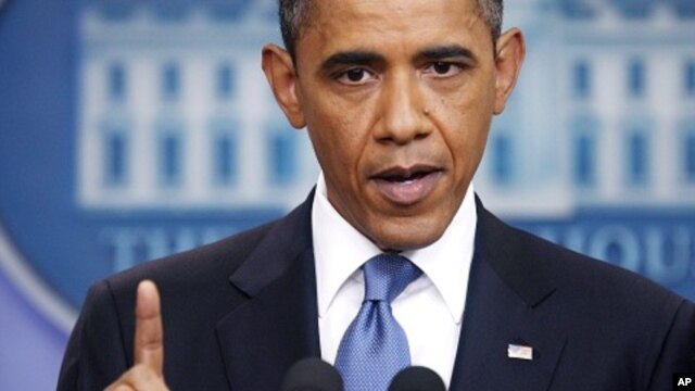 U.S. President Barack Obama makes a point during a news conference on debt negotiations with the U.S. Congress in the briefing room of the White House in Washington, July 11, 2011.