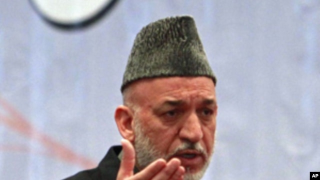 Afghan President Hamid Karzai speaks during a teachers' graduation ceremony in Kabul March 30, 2011.