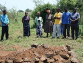 Thuli Makama visits the grave of a villager killed by a game park ranger in Swaziland.