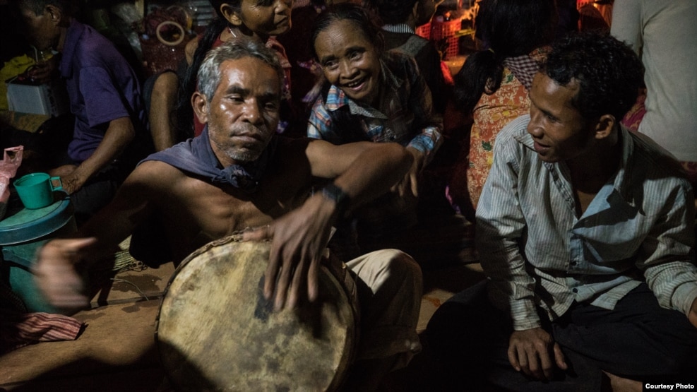 Elders and villagers in Areng Valley celebrate a spiritual ceremony called "Thvay Bangkum Kru" or "To Welcome the Spirit". (Courtesy photo of Mam Kalyanee) 