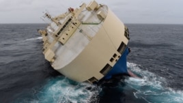 In this photo taken on Thursday, Jan. 28, 2016 and provided by the  Prefecture Maritime Atlantique on Jan. 29, 2016, the cargo ship "Moderm Express" is pictured drifting off the coast of France. 