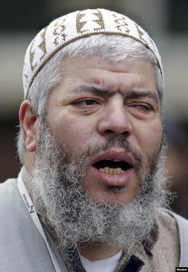 Muslim cleric, Abu Hamza al-Masri, leads prayers at the North London Central Mosque in Finsbury Park in this February 7, 2003 photograph.