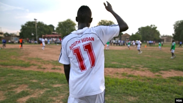In this June 28, 2012 photo, a footballer for the new South Sudan national team wears a brand new shirt as the country prepares to play its first match around its first anniversary on July 9.