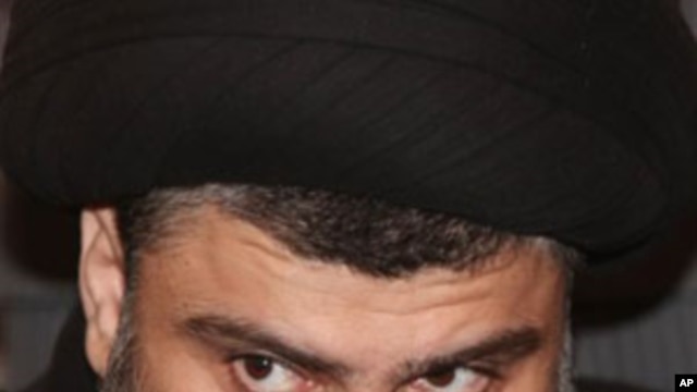 Shi'te cleric Muqtada al-Sadr attends Friday prayers in Kufa, 160 kilometers (100 miles) south of Baghdad, Iraq, 14 Jan 2011