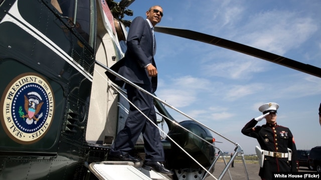 FILE - President Barack Obama disembarks Marine One. (Official White House Photo by Pete Souza)