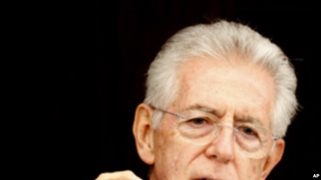 Italian Prime Minister Mario Monti briefs the media in Rome, Sunday, Dec. 4, 2011.
