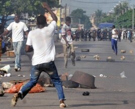 Several dozens of Ivorian opposition youth clash with police during a demonstration on 17 Feb 2010 in Abidjan against the dissolution of Ivorian cabinet and electoral commission