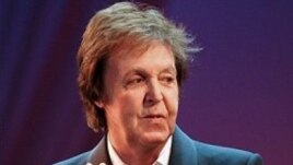 Paul McCartney during 26 Oct concert performance