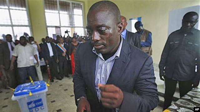 Congolese president Joseph Kabila casts his ballot in the country's presidential election at a polling station in Kinshasa, Democratic Republic of Congo, November 28, 2011.