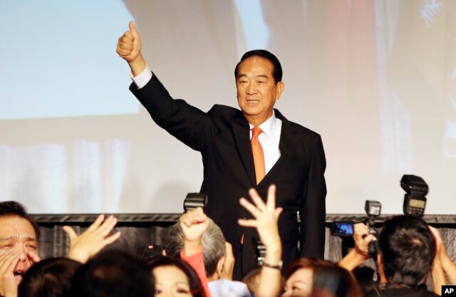 Taiwan's People First Party Chairman James Soong gives a thumbs-up to supporters as he announces his candidacy in the January 2016 presidential election, in Taipei, Taiwan, Thursday, Aug. 6, 2015.