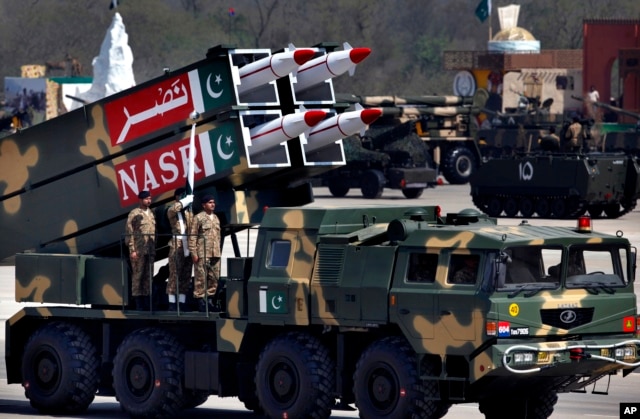 FILE - A Nasr missile is loaded on vehicle during the Pakistan National Day parade in Islamabad, Pakistan, March 23, 2015.