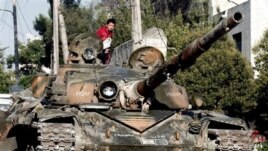 Xe tăng bị hư trrong thành phố Aleppo