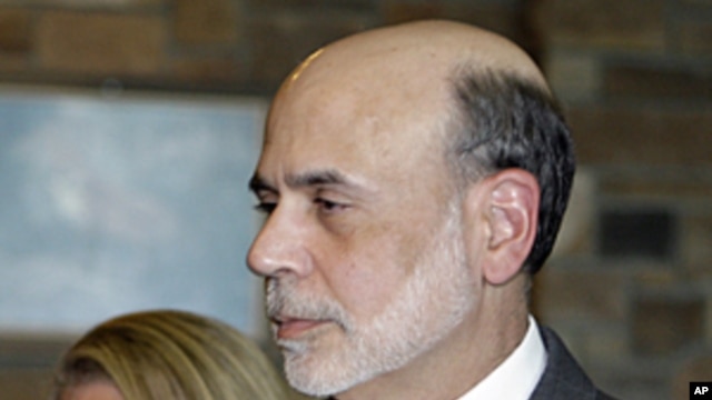 Federal Reserve chairman Ben Bernanke and his wife Anna arrive at an evening reception and dinner at the inaugural event of the annual Economic Policy Symposium at Jackson Hole in Moran, Wyoming, August 25, 2011