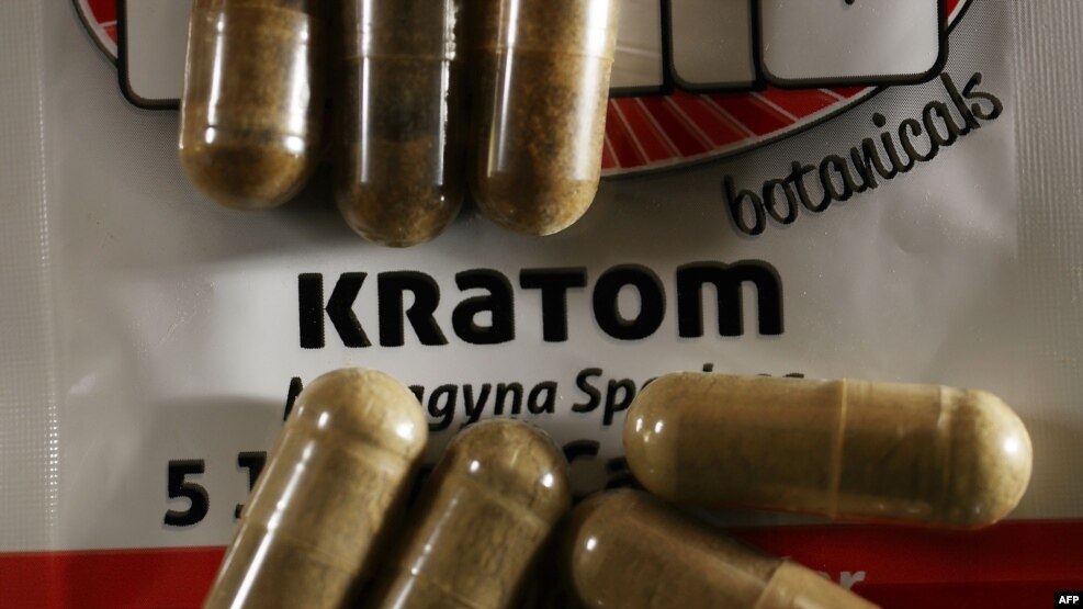 In this photo illustration, capsules of the herbal supplement kratom are seen in Miami, Fla., May 10, 2016.