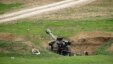 Armenian soldiers aim a howitzer, April 3, 2016, in the village of Mardakert, in the separatist region of Nagorno-Karabakh.
