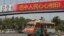 ທະຫານຄົນນຶ່ງຍ່າງຢູ່ໃກ້ລົດເມ ໃນຂະນະທີ່ຊ່ວຍ ປ້ອງກັນຄວາມສະຫງົບຢູ່ໃນຂົງເຂດ ແລະເຮັດໃຫ້ຄົນຫລີກທາງ ກ່ອນຂະບວນລົດ ແຫ່ທ່ານ Li Keqiang ນາຍົກລັດຖະມົນຕີຈີນ ຜ່ານໄປ ຢູ່ທີ່ນະຄອນ Islamabad ຂອງປາກິສຖານ ໃນວັນທີ 22 ພຶດສະພາ 2013