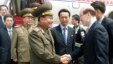 Choe Ryong-Hae, left, director of the General Political Bureau of the Korean People's Army (KPA) of North Korea, shakes hands with Chinese official upon arrival at the airport, Beijing, May 22, 2013.