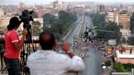 Journalists work in Egypt last year.