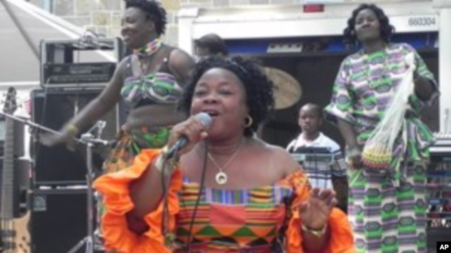 Liberian singer Tokay Tomah entertains the crowd with one of her hit songs "Chay-Chay Polay"