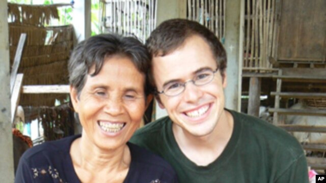 Koet Ran (right) teaches the chants to around 30 students at Cambodia Living Arts, an NGO established to foster Cambodian art forms and Trent Walker (left) is an American PhD student at the University of Berkeley, who has spent years studying this and oth