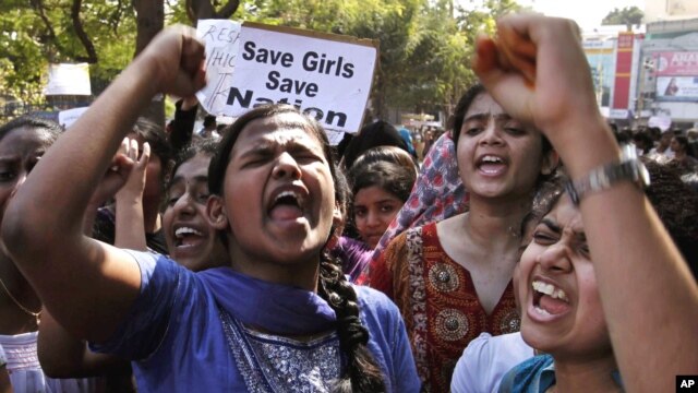 Indian students shout slogans during a protest rally in Hyderabad, India, December 31, 2012. 
